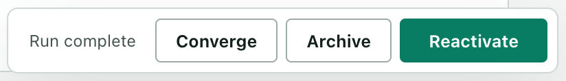 The viewer footer of a finished spec reading Run complete, with Converge, Archive and a green Reactivate button.